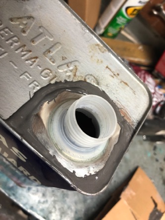 The new spout was attached to the old can using JB Weld