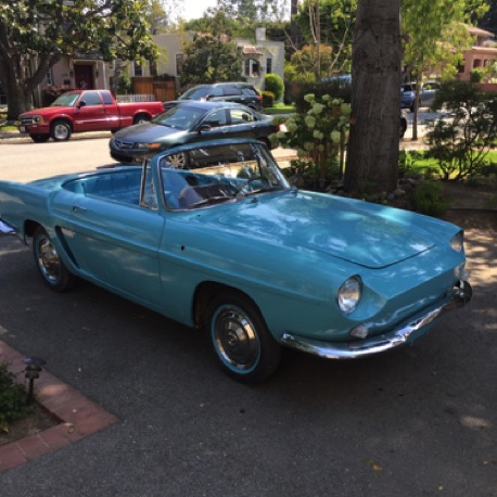 In the driveway with larger hubcaps